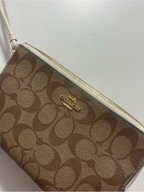 Coach Brown Signature Canvas Wristlet with Gold Hardware and Cream Trim
